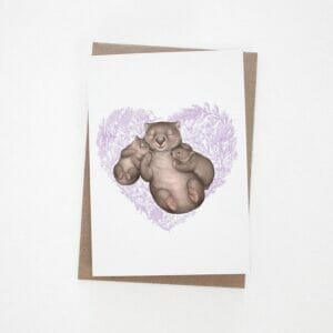 Greeting card with a mother and baby wombats cuddling